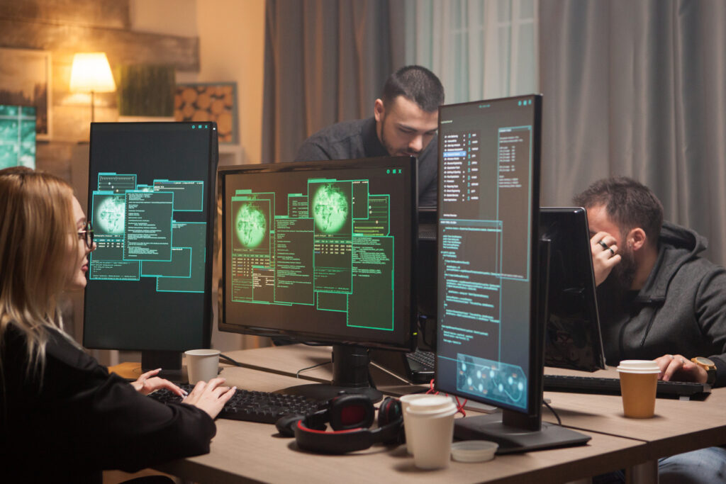 female hacker with her team of cyber terrorists